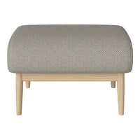 Gray textured fabric ottoman with natural wood legs, showcasing a minimalist design perfect for modern decor.