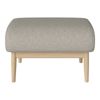 Gray upholstered ottoman with a textured pattern and light wood legs, adding modern elegance to any space.