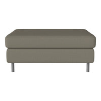 Stylish taupe ottoman with a smooth fabric finish and modern silver legs. Perfect for any contemporary space.