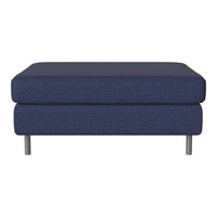 Navy blue upholstered ottoman with a textured pattern and sleek metal legs. Perfect for modern living spaces.