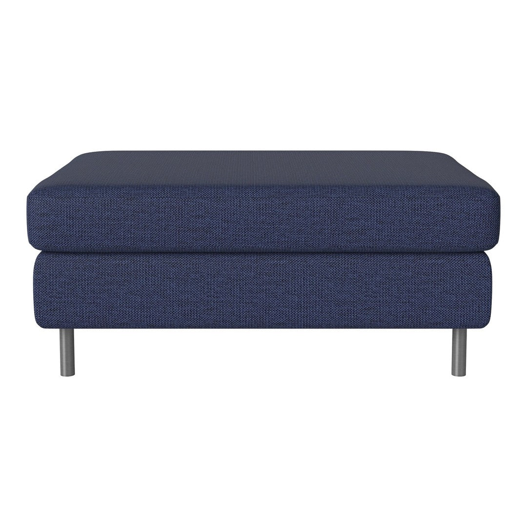 Navy blue upholstered ottoman with a textured finish and sleek metallic legs. Perfect for any modern living space.