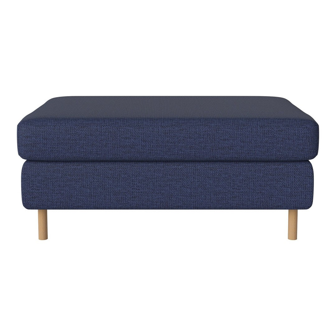 Navy blue upholstered ottoman with a textured pattern and wooden legs. Minimalist design for modern decor.
