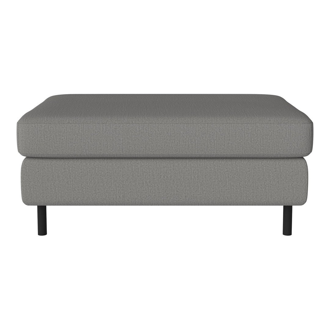 Gray upholstered ottoman with textured pattern and black legs. Elegant, modern design complements various decor styles.