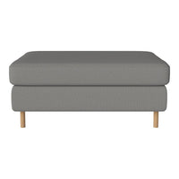 Gray upholstered ottoman with a textured pattern and light wooden legs, adding modern style to any space.