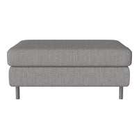 Gray upholstered ottoman with a smooth texture and minimalist design, featuring metal legs for a modern touch.