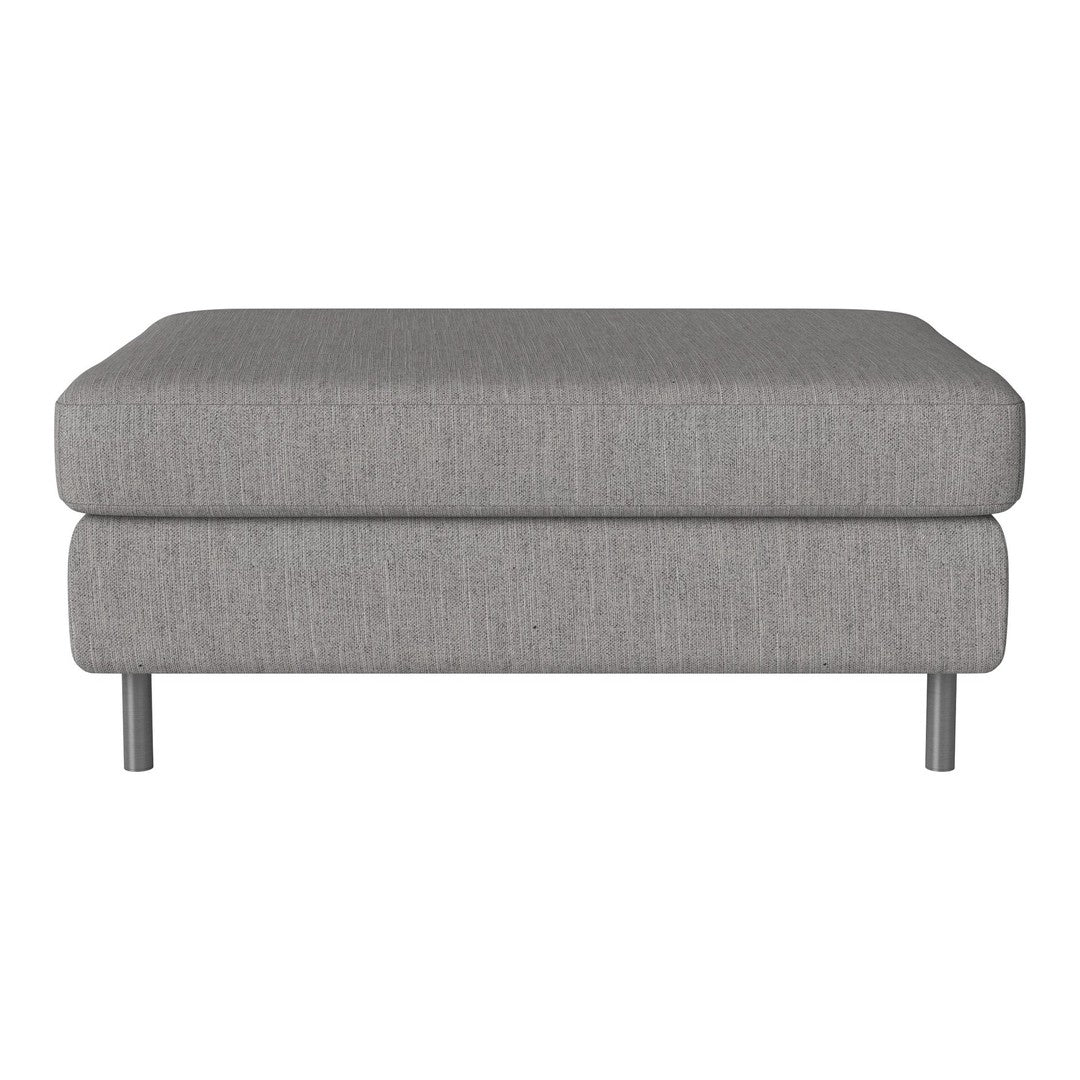 Gray upholstered ottoman with a smooth texture and minimalist design, featuring subtle linear patterns on the fabric.