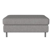 Gray upholstered ottoman with a smooth texture and minimalist design, featuring subtle linear patterns on the fabric.