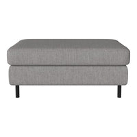 Grey upholstered ottoman with a textured fabric pattern and sleek black legs, ideal for modern decor.