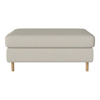 Light beige upholstered ottoman with a smooth texture and natural wooden legs, perfect for modern decor.