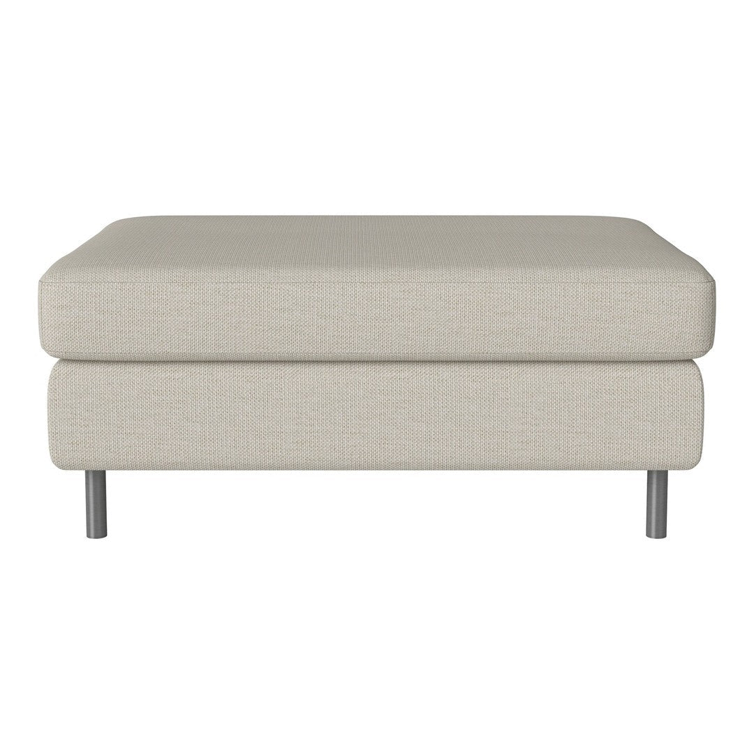 Light beige ottoman with a smooth fabric finish and minimalist design, featuring sleek metal legs.