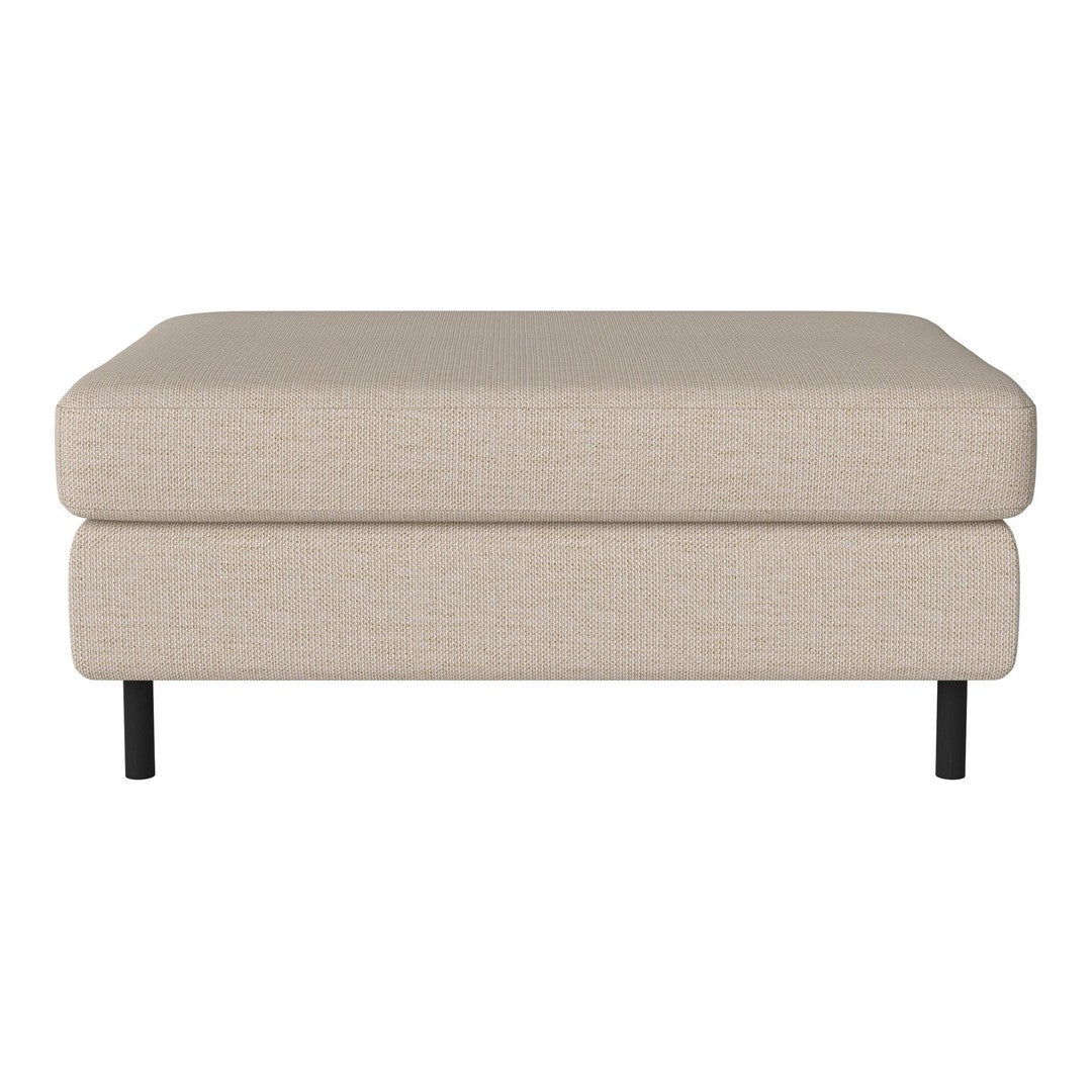 Beige upholstered ottoman with a minimalist design and black legs, ideal for versatile home decor.
