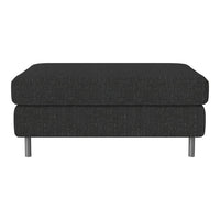 Dark gray ottoman with a textured fabric pattern and sleek metal legs, ideal for modern interiors.
