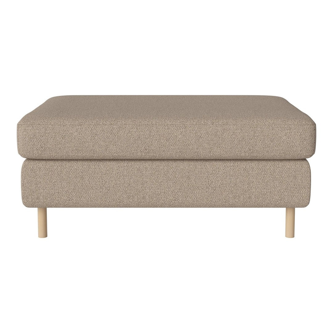 Beige upholstered ottoman with a smooth texture and light wood legs, perfect for modern living spaces.