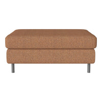 Brown textured ottoman with a minimalist design and metal legs, perfect for modern decor.