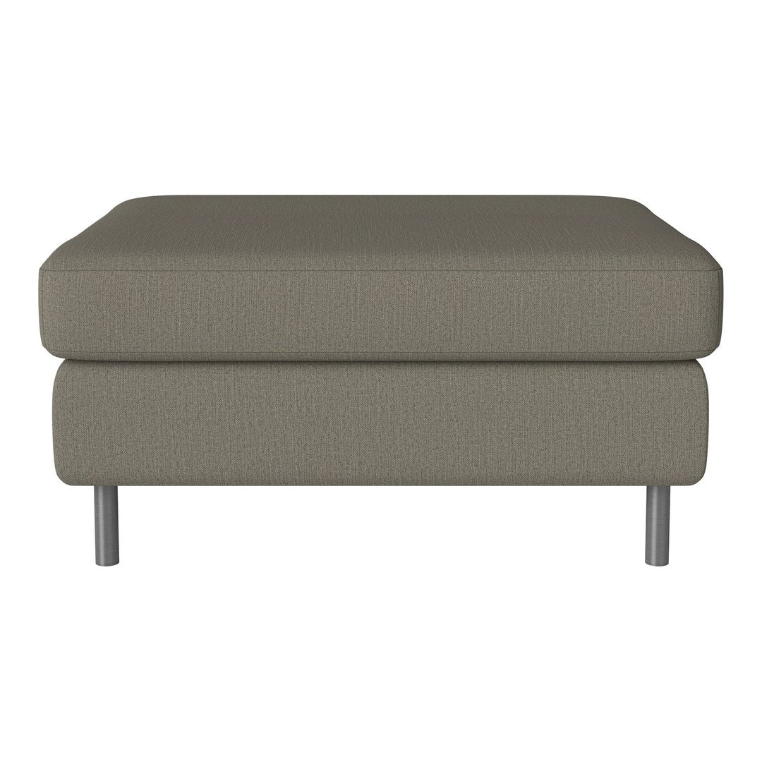 Neutral taupe ottoman with a textured fabric and sleek silver legs, offering a modern minimalist style.