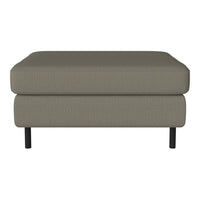 Taupe fabric ottoman with a smooth texture and minimalist design, featuring black metal legs for a modern touch.
