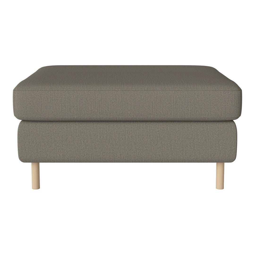 Olive green upholstered ottoman with a textured pattern, featuring natural wood legs. Modern and minimalist design.