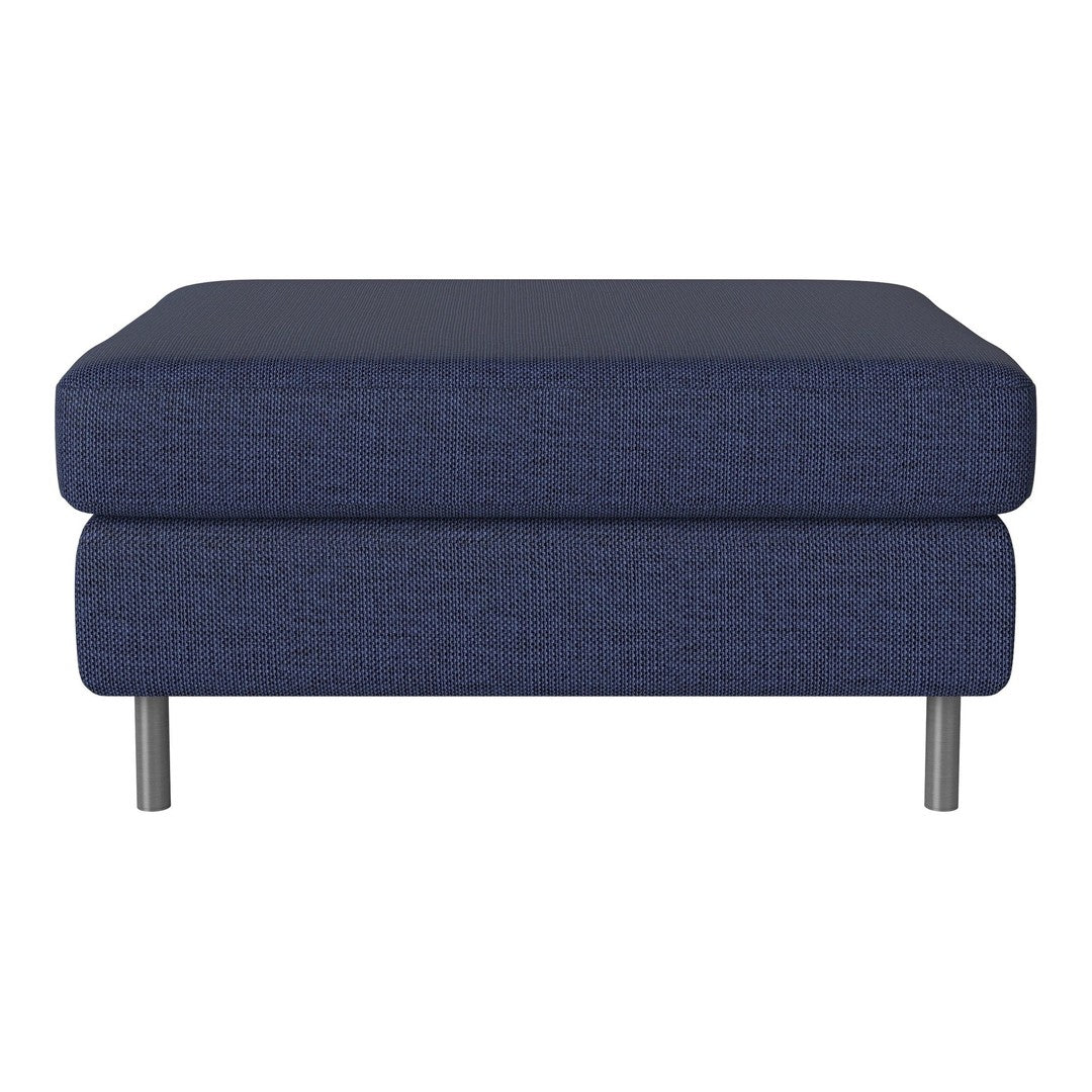 Navy blue upholstered ottoman with a smooth texture and minimalist design, featuring sleek metal legs.