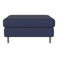 Navy blue upholstered ottoman with a smooth texture and minimalist design, featuring sleek metal legs.