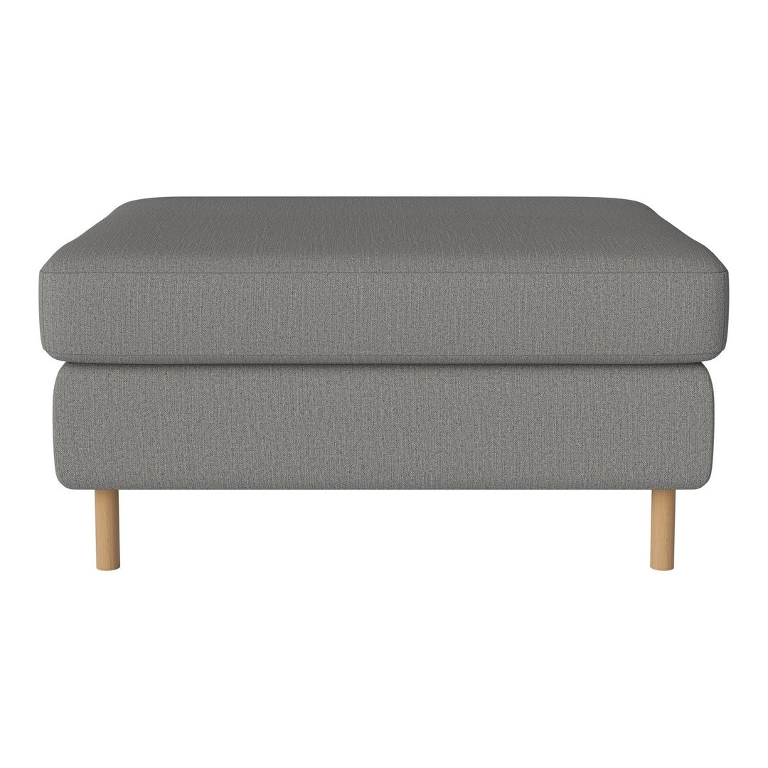 Gray upholstered ottoman with textured pattern and natural wood legs. Ideal for modern living spaces.