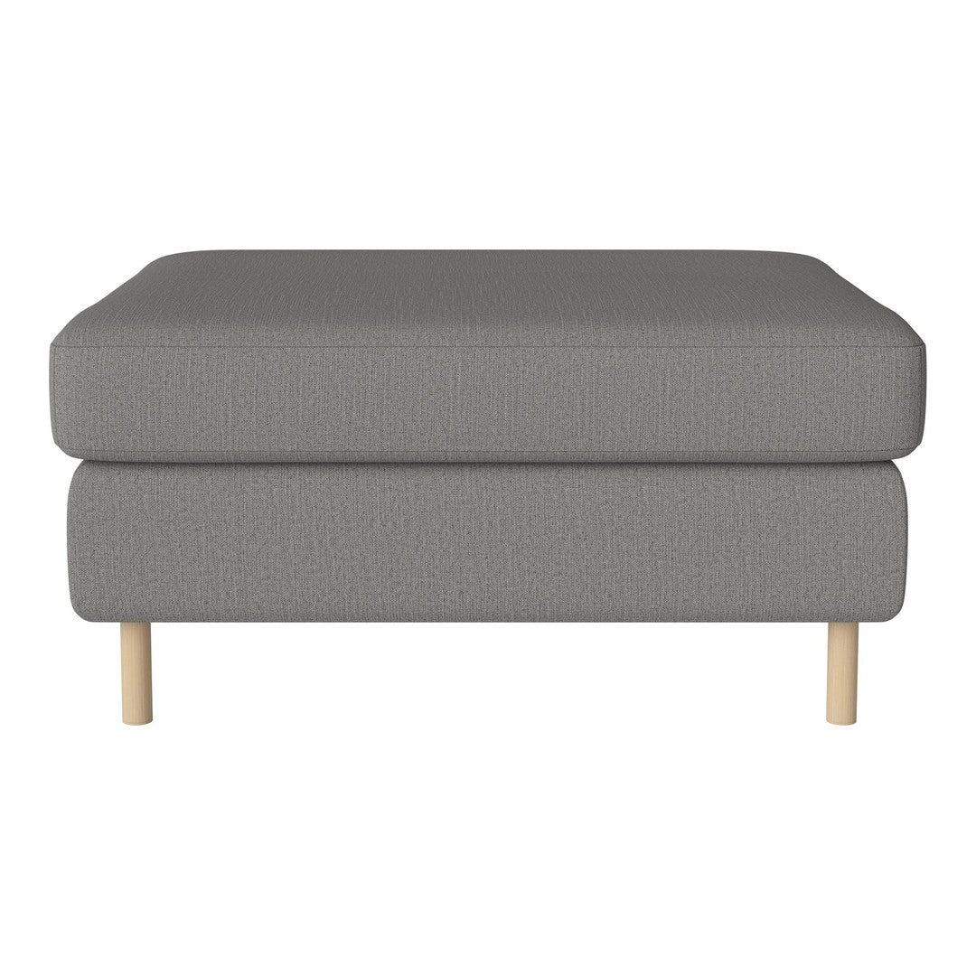 Gray upholstered ottoman with a smooth texture and natural wooden legs, perfect for minimalist decor.
