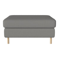 Gray upholstered ottoman with a smooth texture and natural wooden legs, perfect for minimalist decor.