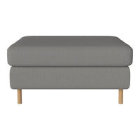 Gray upholstered ottoman with subtle textured pattern and light wooden legs. Stylish and modern design for any decor.