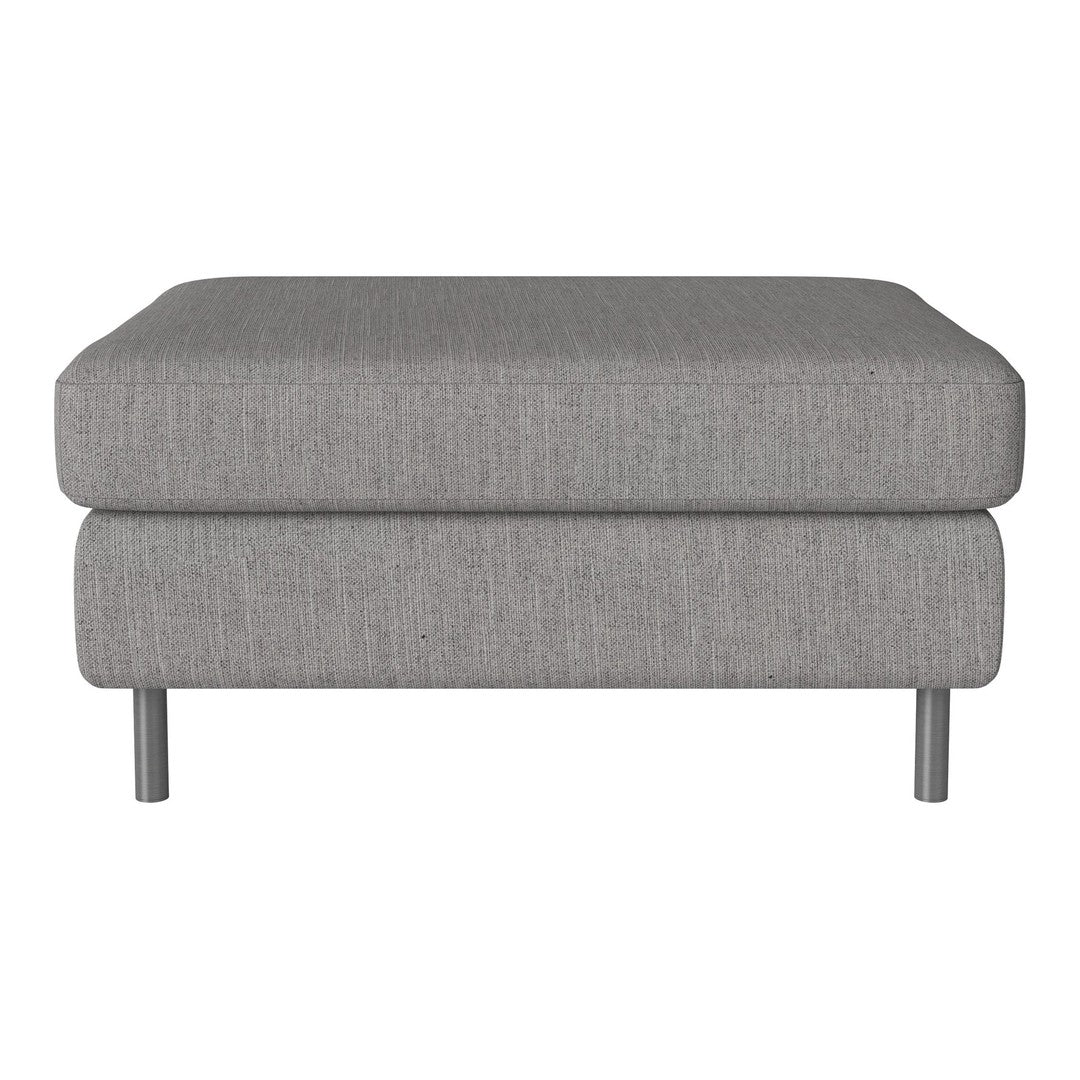Gray upholstered ottoman with a smooth texture, featuring a minimalist design and sleek metal legs.
