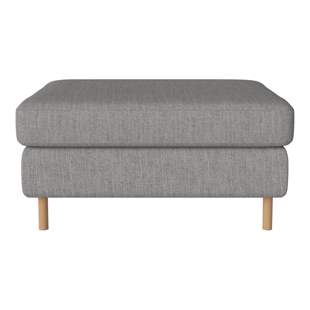Gray upholstered ottoman with textured fabric and wooden legs, featuring a minimalist design.