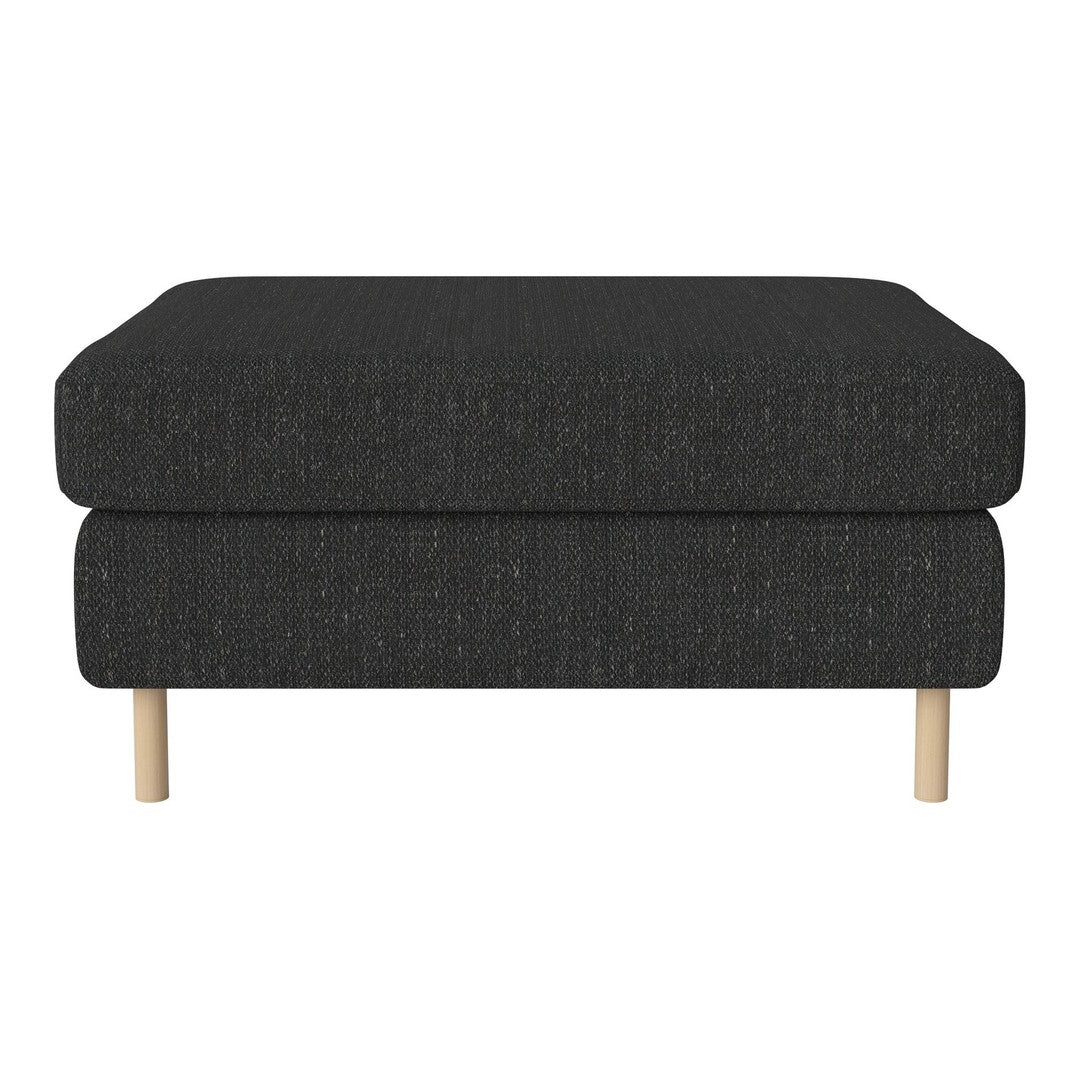 Black textured ottoman with natural wood legs, perfect for modern decor.