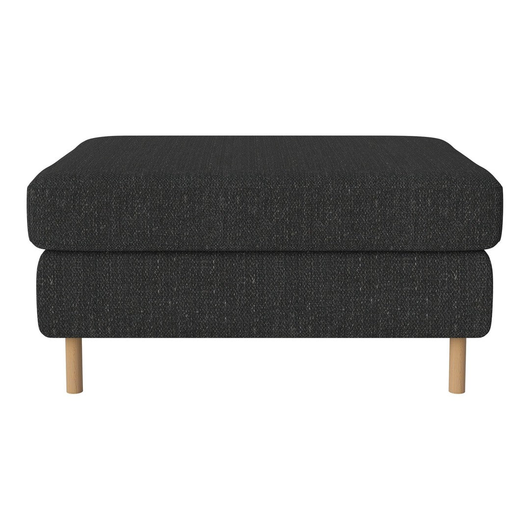Black textured ottoman with two layers and light wood legs, featuring a minimalist design for modern interiors.