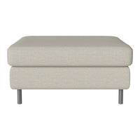 Light beige ottoman with a simple, textured fabric and sleek, silver legs. Ideal for modern decor.