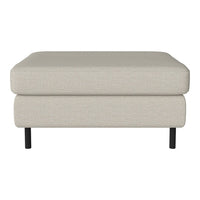 Light beige upholstered ottoman with a simple texture, complemented by black metal legs. Stylish and versatile design.