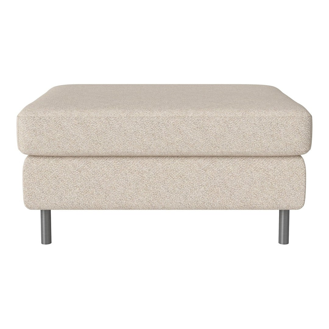 Light beige ottoman with a textured fabric, featuring a minimalist design and silver metal legs.