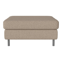 Beige textured ottoman with a smooth top and sleek metal legs, perfect for any modern living space.