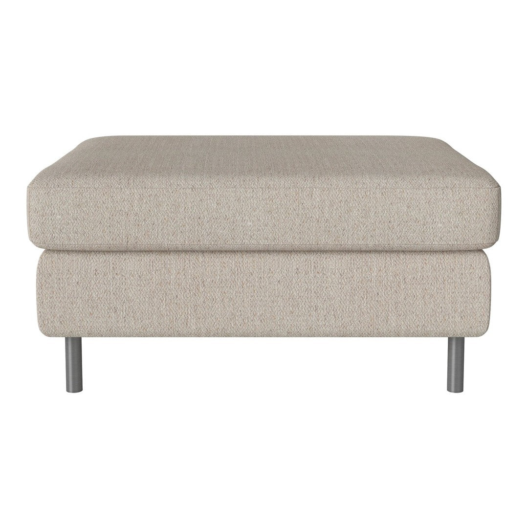 Beige upholstered ottoman with a smooth texture and minimalist design, featuring silver metal legs.