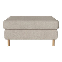 Light beige upholstered ottoman with a smooth, textured surface and natural wood legs. Perfect for modern decor.