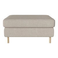 Light beige ottoman with a textured fabric and natural wood legs, perfect for modern home decor.