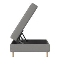 Stylish gray upholstered storage bed with wooden legs, featuring a minimalist design and clean lines.
