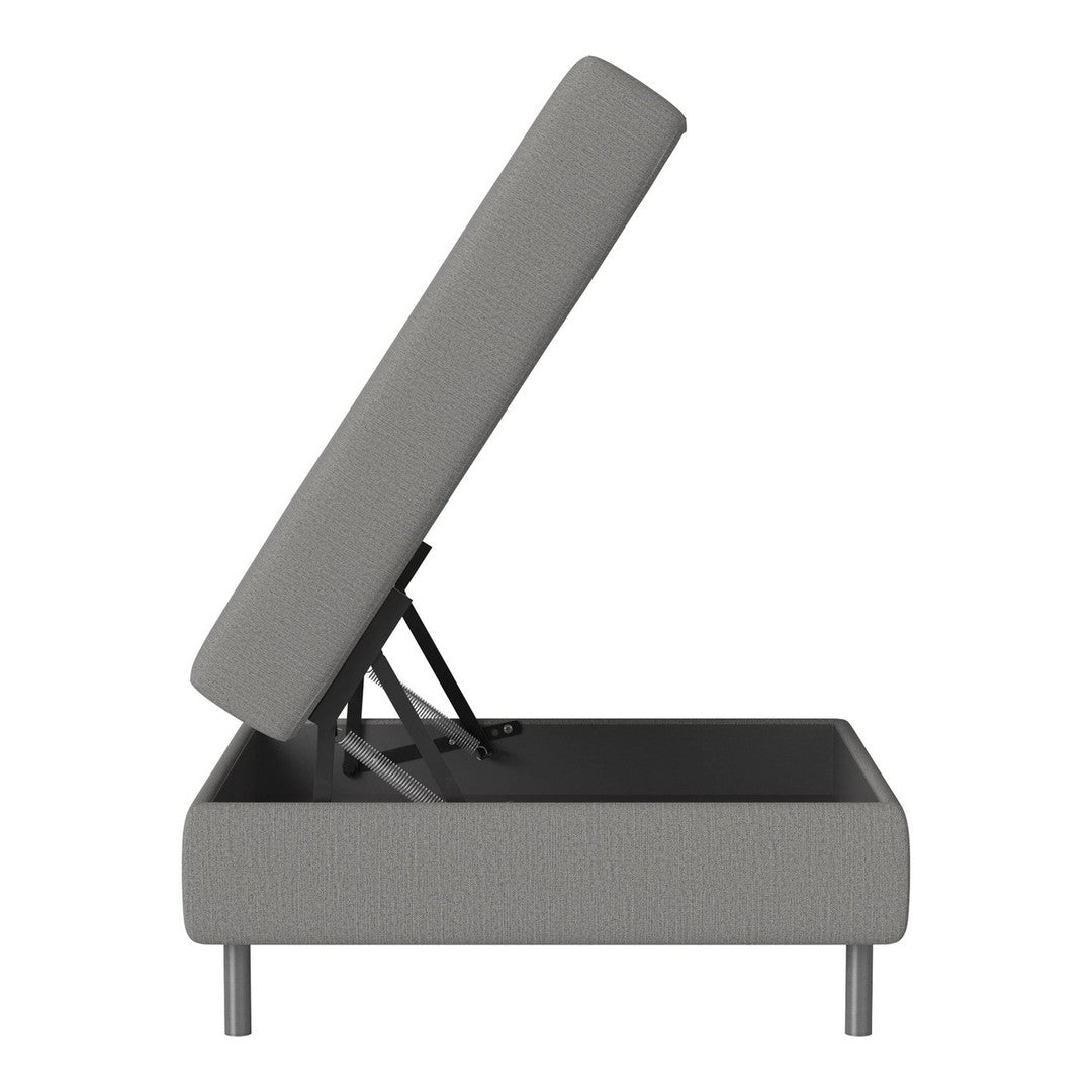 Gray upholstered storage bed with a subtle textured pattern and sleek metal legs. Versatile and modern design.