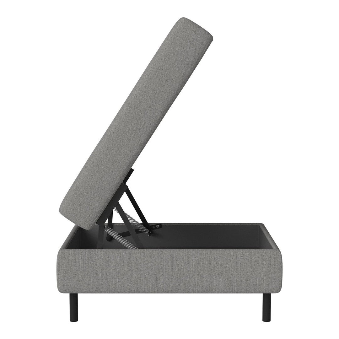 Gray upholstered storage bed with a textured pattern and sleek black legs, showcasing a modern design.