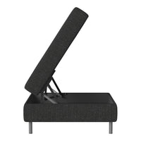 Black upholstered storage ottoman with a textured pattern and silver metal legs, partially opened to reveal interior space.