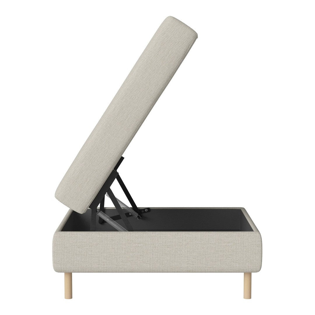 Light gray upholstered storage bed with natural wood legs and a clean, minimalist design.