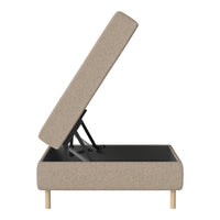 Beige upholstered storage ottoman with wooden legs, featuring a clean, modern design and a fabric texture.