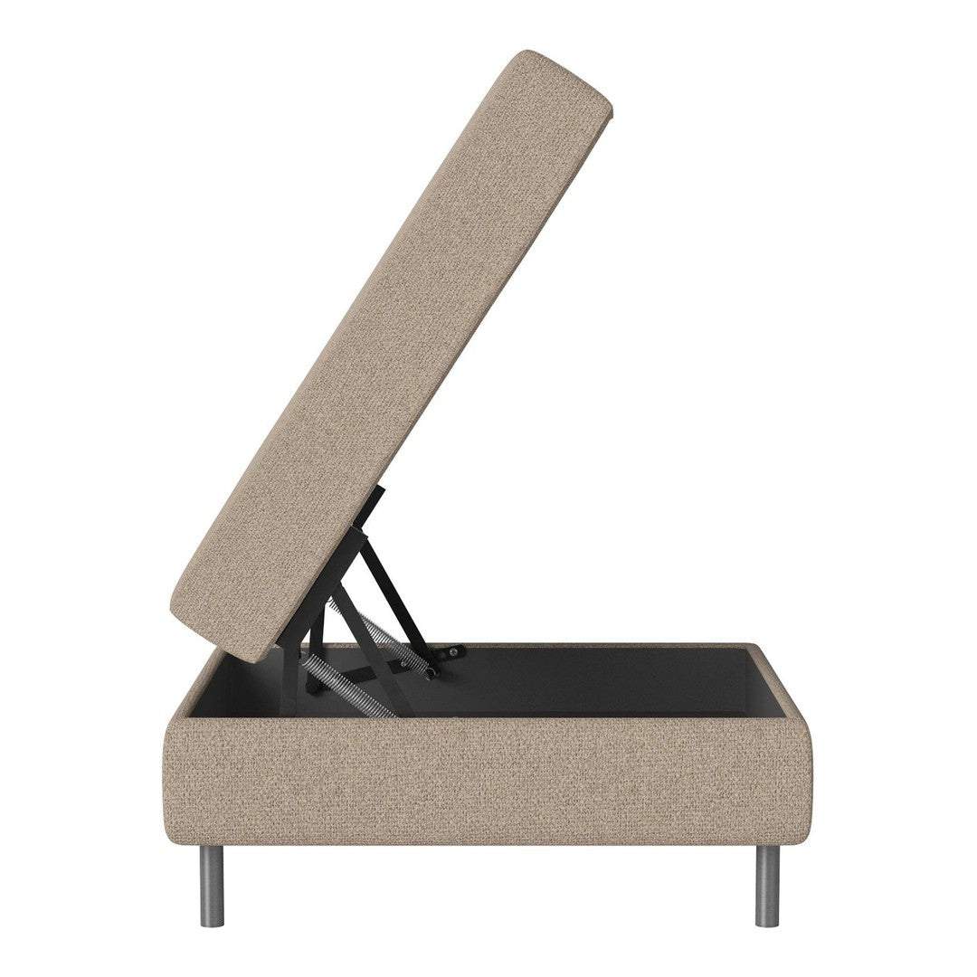 Beige upholstered storage ottoman with a sleek design and open top. Modern metallic legs enhance its contemporary look.