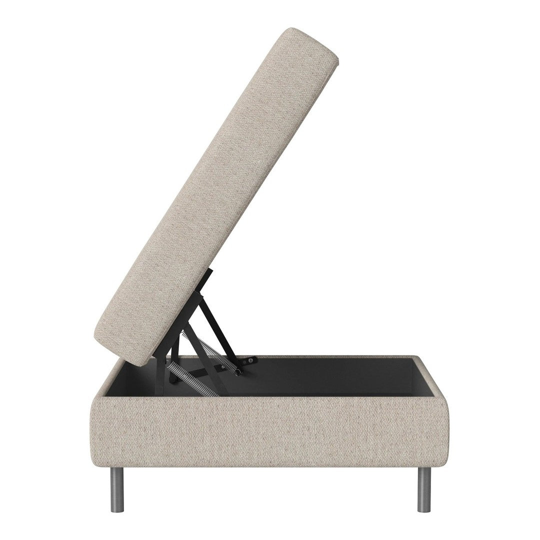 Light beige upholstered storage ottoman with sleek minimalist design and metal legs, featuring a solid black interior.