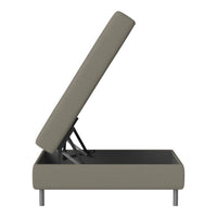 Gray upholstered storage bed with sleek metal legs, showcasing a simple and modern design.