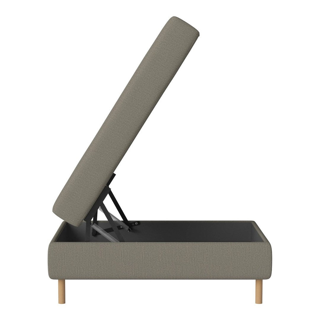 Gray upholstered storage ottoman with a minimalist design and natural wooden legs. Stylish and functional home decor.