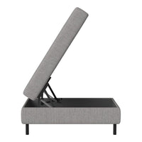 Gray upholstered storage bed with a sleek, minimalistic design and black metal legs. Modern, stylish, and functional.