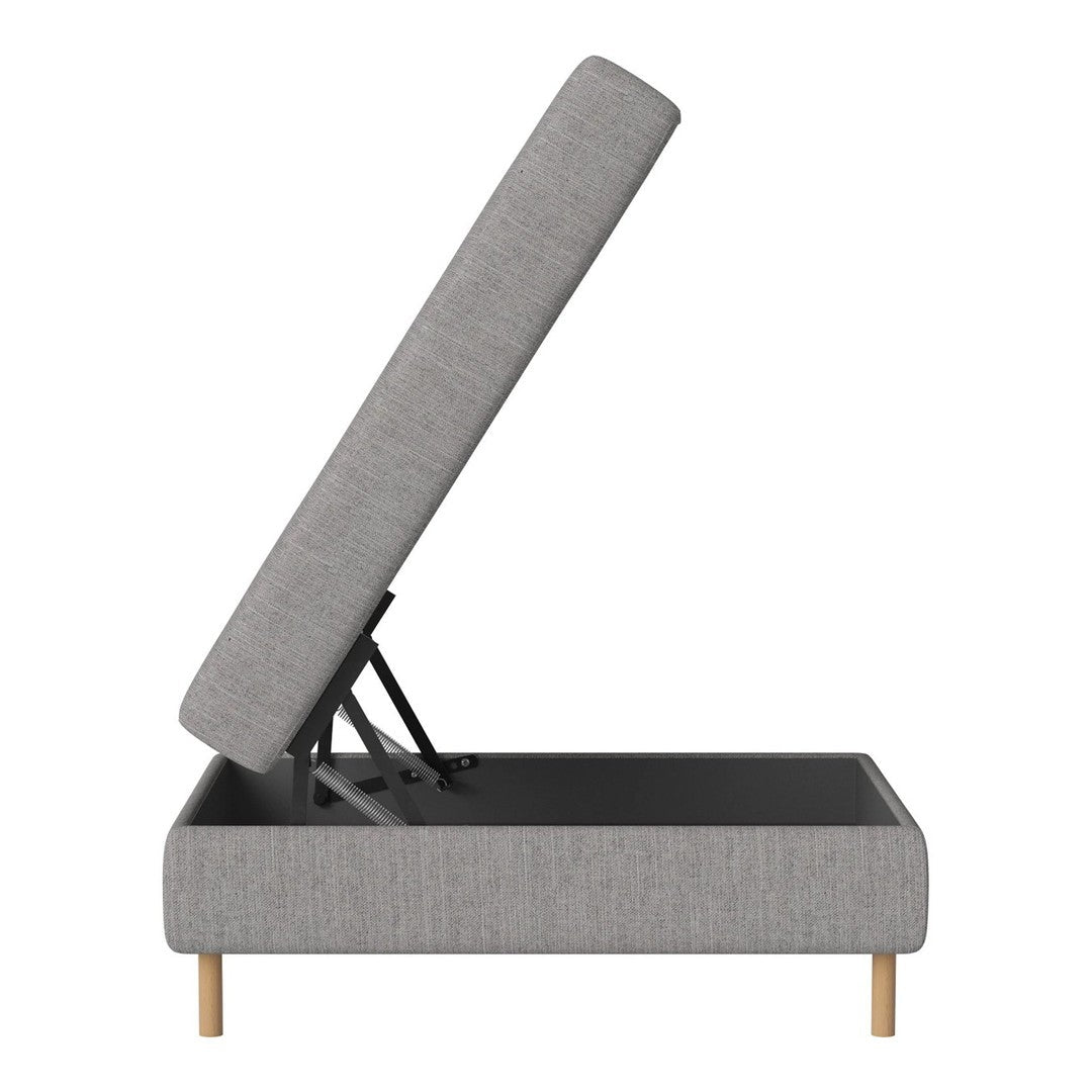Gray upholstered storage bed with a minimalist design and light wooden legs. Modern and versatile for any decor.